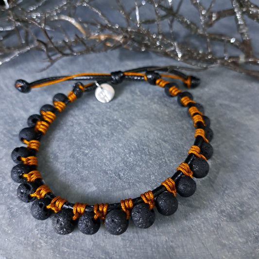 RICK, bracelet, lava stone 6mm, black/mustard