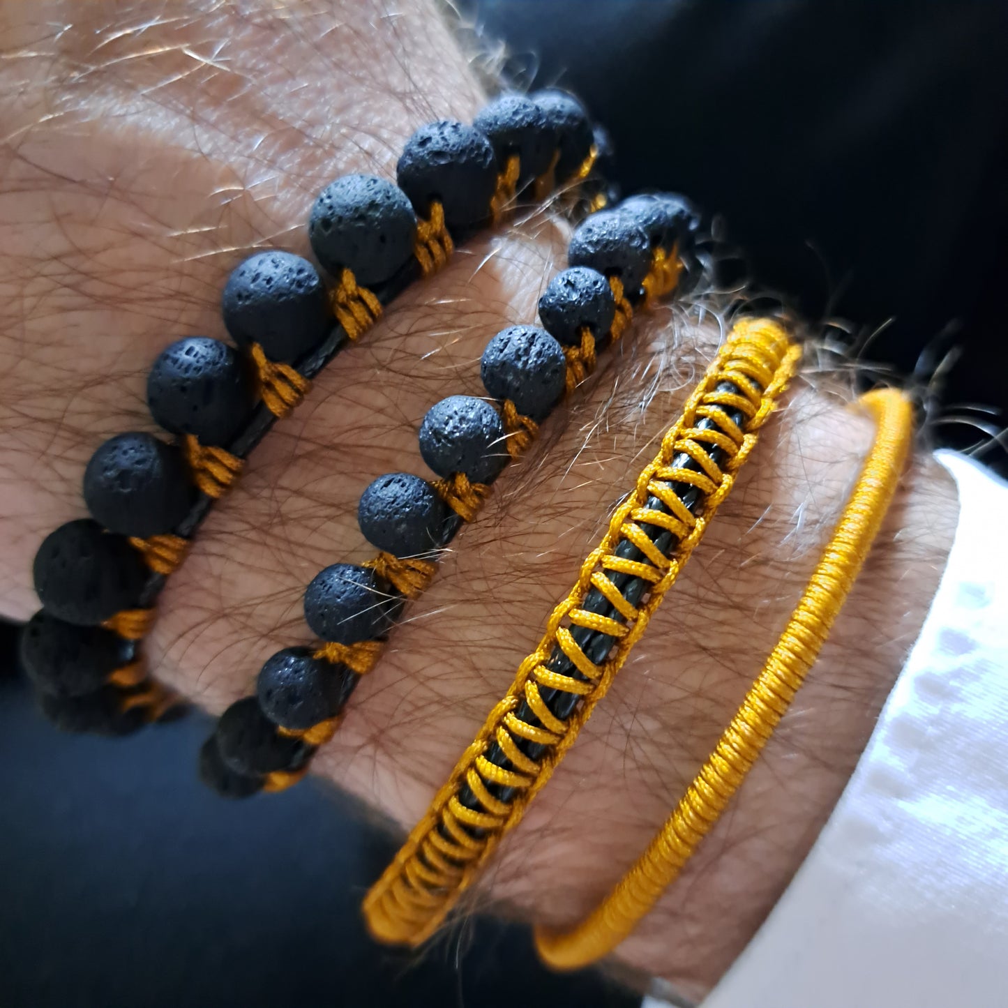 RICK, bracelet, lava stone 6mm, black/mustard